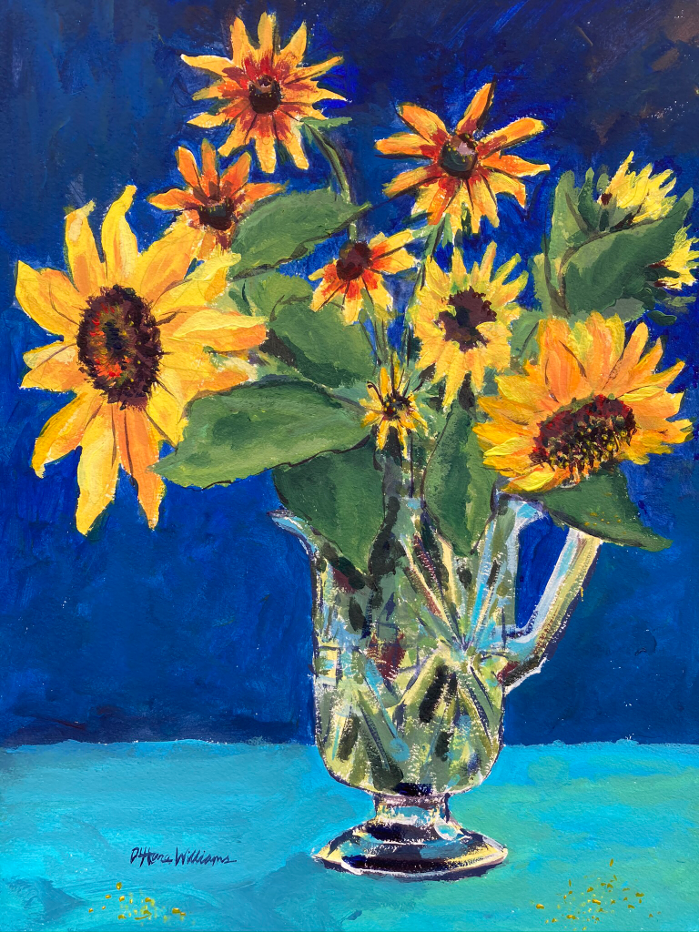 a cut glass vase with many sunflowers in it with blue background